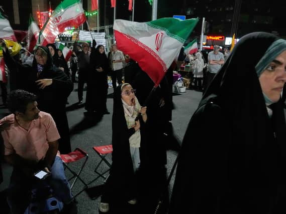 Israel and Iran exchange strikes after Beirut attack, in photos