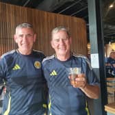 Brothers Peter (left) and Sean Reilly, who are in Boston for the World Cup