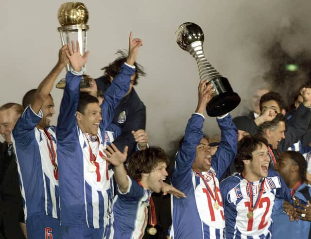 Bottom right, enjoying trophy success with Porto