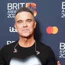 Robbie Williams at the the Brit Awards 2025