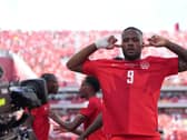 Cyle Larin celebrates