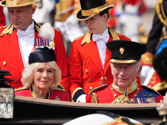 The King and Queen in the Ascot Landau carriage travelling to the Trooping the Colour ceremony in central London