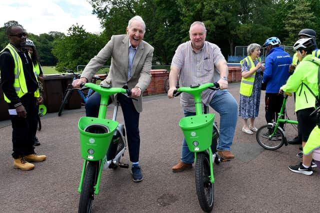 The Kidical Mass ride at East Park, Wolverhampton.
Cycling legend Hugh Porter and council leader Steve Simkins enjoy the event on some Lime Bikes.