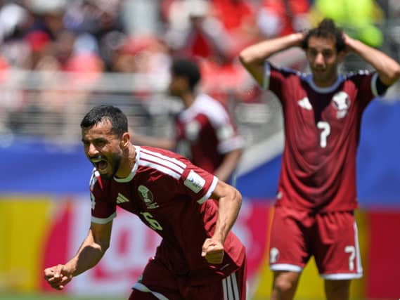 Qatar’s Boualem Khoukhi celebrates