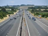 Vehicles travel along an unusually quiet M4 motorway near Bristol