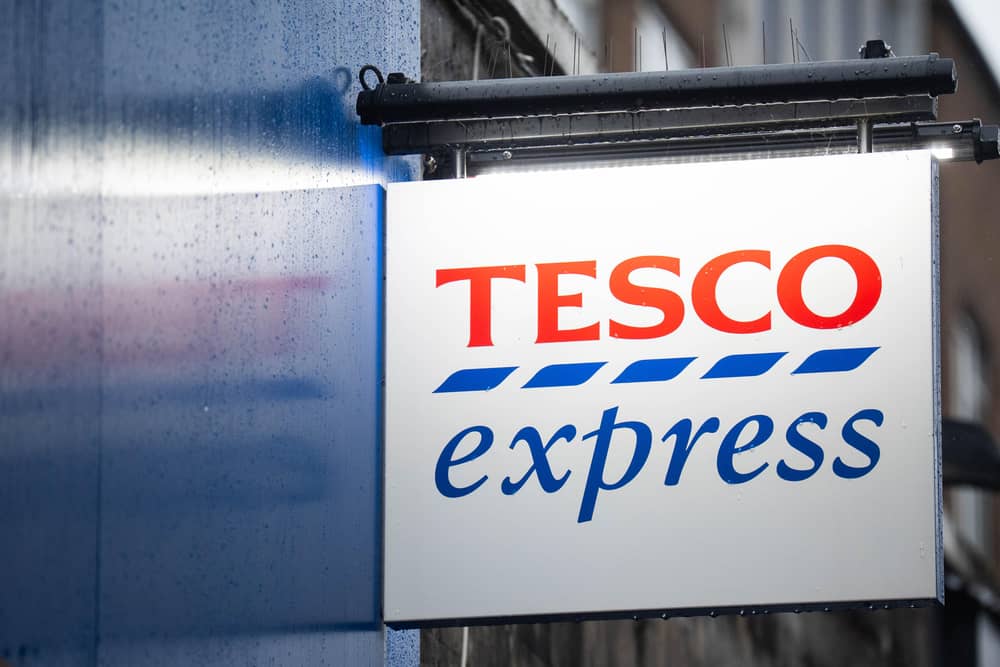 A Tesco Express logo on a storefront in Bayswater, west London