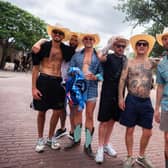 England fans pose for a photo in the Fort Worth Stockyards
