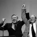 Roy Hattersley (left) with Neil Kinnock celebrating on stage