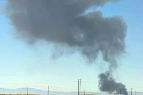 Smoke plumes after the crash