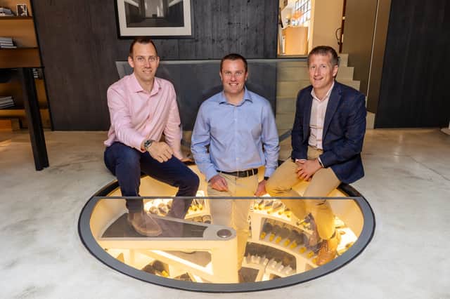 L-R: Sam Stockdale and Mark Down, of Spiral Cellars, with Simon Kelsall of Frontier Development Capital