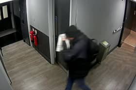 Video grab of Paul Hughes leaving a gym.