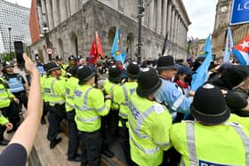 Protests in Brum. Union Jacks are Britain First and other pics are the opposition protest.   The anti Britain First protest push against Police.