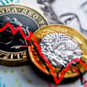 British pound sterling coin and banknotes, falling exchange rate