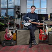 Johnny Marr with a selection of guitars