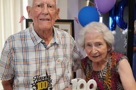 Military veteran Reg Smith from Wolverhampton celebrates his 100th Birthday with neighbour Caroline Jones.
