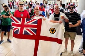 Gary Allen (2R) with son Cullen (R) at the England v Croatia match.  //  England fans who went to the 1986 World Cup and never came back were reunited in the USA at last night's game - with one even blagging his way into a Croatian VIP box.  Gary Allen, Stuart Bates, David Arnold and Garry Hardwicke jetted off to Mexico 40 years ago to follow the Three Lions while they were aged between 20 and 23.