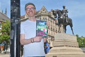 Wolverhampton author Mark Edwards with his new book in Wolverhampton city centre 