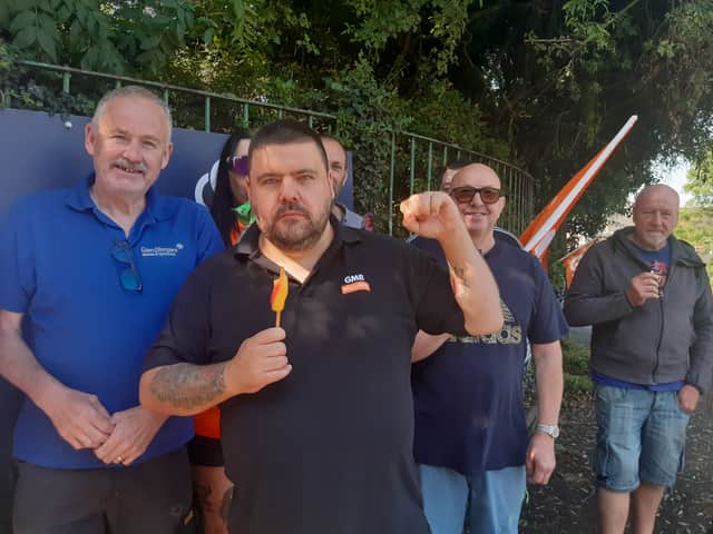 Striking workers at Glen Dimplex in Dudley - with GMB regional organiser Stuart Perry,  front centre