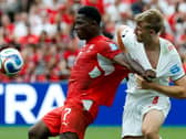 Switzerland’s Breel Embolo (left) fights for the ball with Canada’s Luc de Fougerolles during the World Cup Group B clash in Vancouver