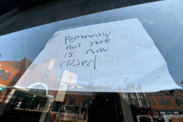 Some of the empty buildings in Walsall town centre.   Park Place and surrounding shops where a mannequin with an axe is the only figure of sorts to be seen .