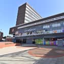 Some of the empty buildings in Walsall town centre.   Park Place and surrounding shops where a mannequin with an axe is the only figure of sorts to be seen .