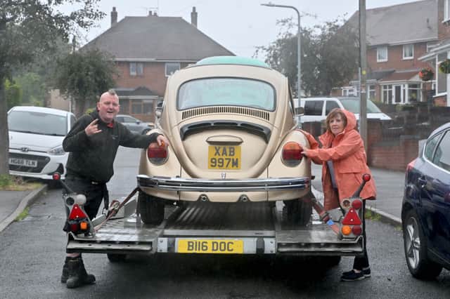 Jan Clay and Lee Southerton with the restored VW Beetle