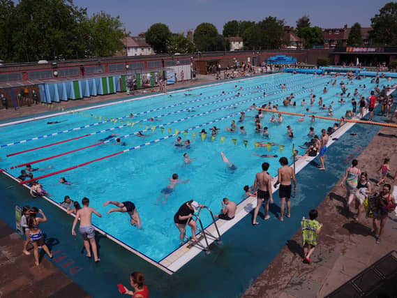 Swimmers enjoying the water at Charlton Lido in south east London