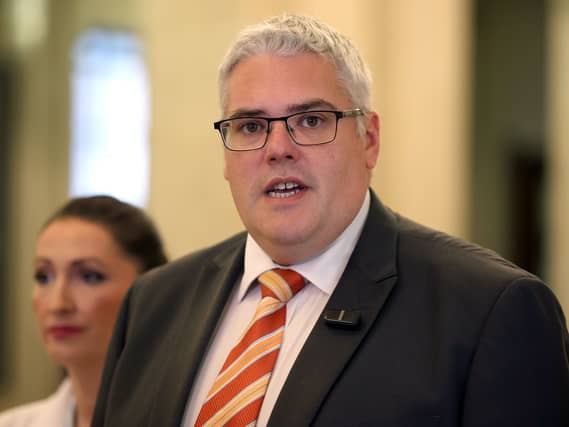 DUP leader Gavin Robinson speaking to members of the media,