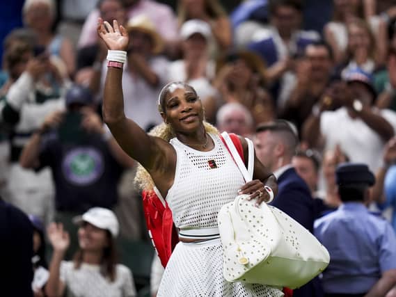 Serena Williams waves to the crowd