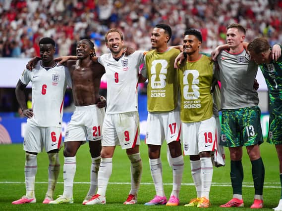 England players celebrating on the pitch
