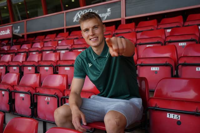 Austrian midfielder Sprangler has joined from St Johnstone.