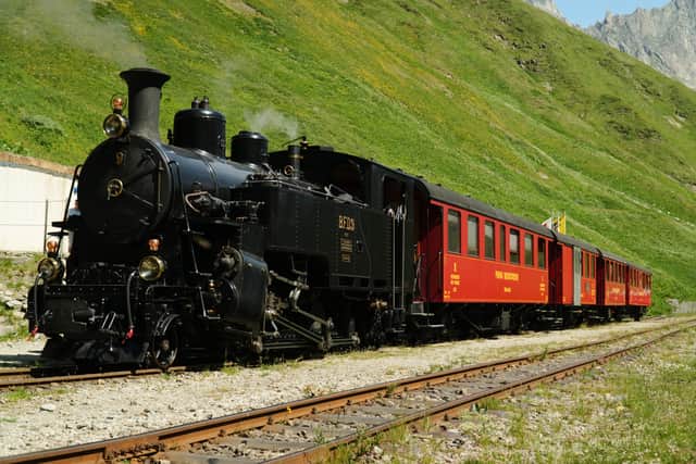 Tourists mark milestone anniversary of Alpine rail route seen in James ...