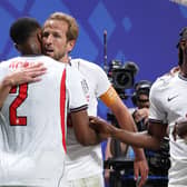 Ezri Konsa celebrates England's match-winner with two-goal hero Harry Kane.