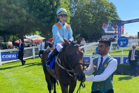 Lazy Griff and Billy Loughnane after winning the Coral Marathon at Sandown