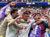Morocco’s Azzedine Ounahi (centre) is congratulated by team-mates after scoring at the 2026 World Cup