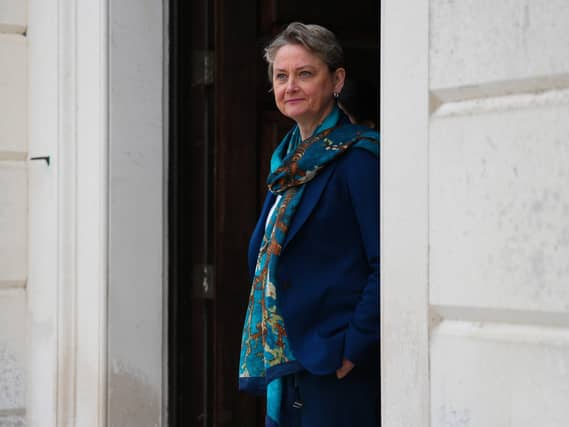 Yvette Cooper standing in a Whitehall doorway