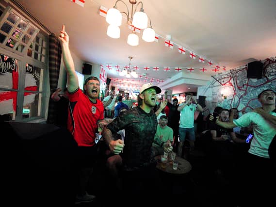 Fans watching England v Mexico