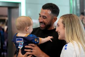 Cape Verde footballer Pico Lopes with his wife Leah and eight-month-old son Diego as he returns home after taking part in the World Cup