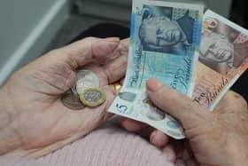 Cash in a person's hand