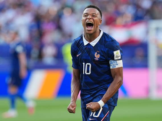 Kylian Mbappe celebrates France's World Cup win over Paraguay