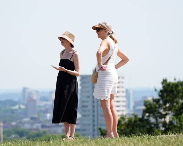 People in hats in the sun