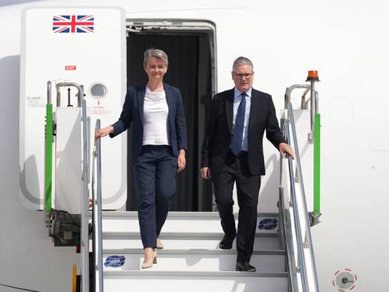 Keir Starmer and Yvette Cooper disembark from the UK government jet
