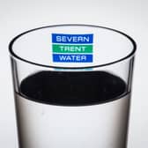 Severn Trent Water logo on a glass of water