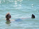 A man floats in water
