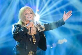 Bonnie Tyler performing on stage