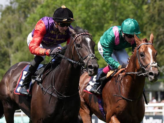 Point Of Law (left) winning the Bahrain Trophy at Newmarket