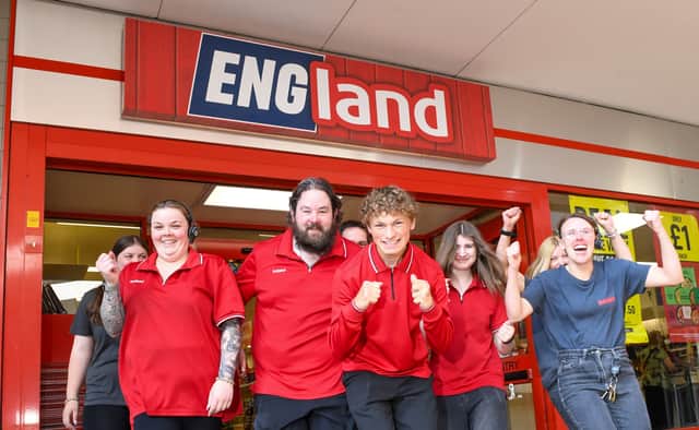 Staff outside Stourbridge's renamed Iceland food store in the Ryemarket - a tribute to England's football heroes