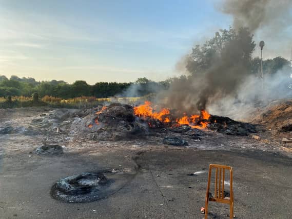 The remains of the Moygashel bonfire, which had a replica mosque placed on top
