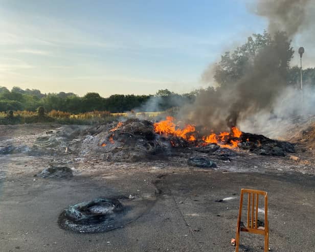 The remains of the Moygashel bonfire, which had a replica mosque placed on top