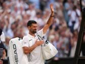 Novak Djokovic waves